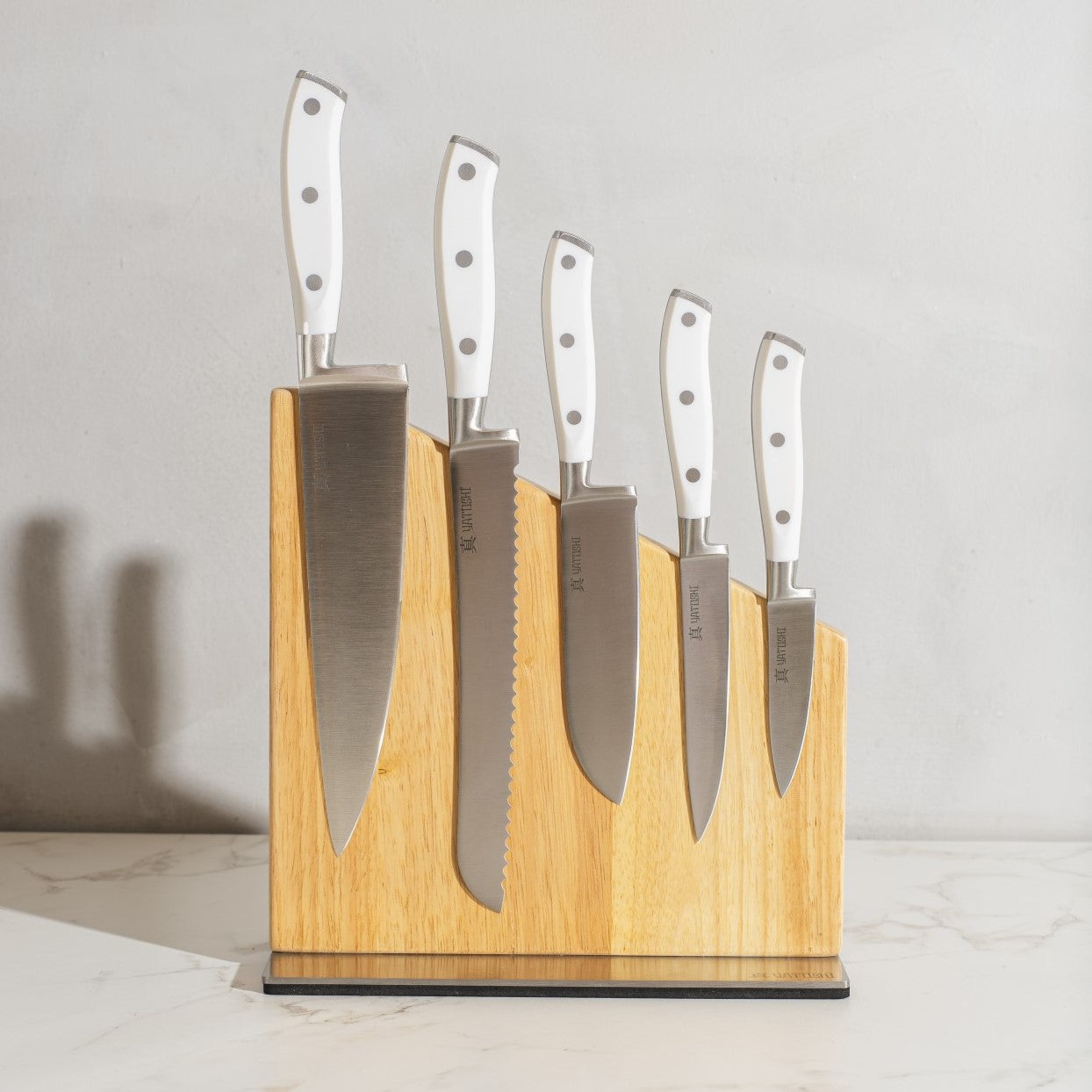 white magnetic block set on kitchen counter