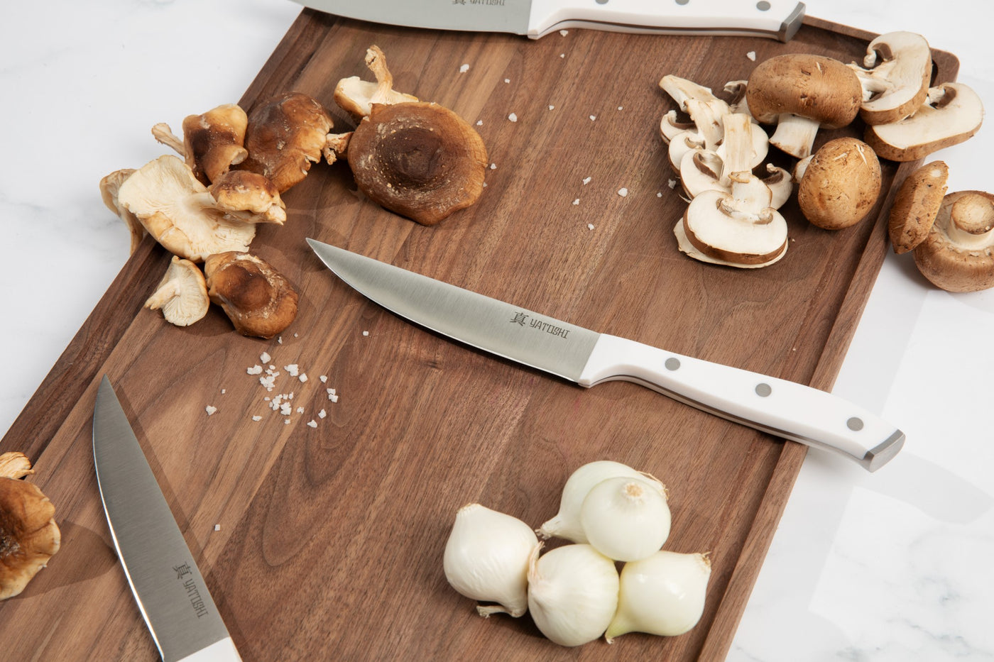 white abs steak knife on a cutting board