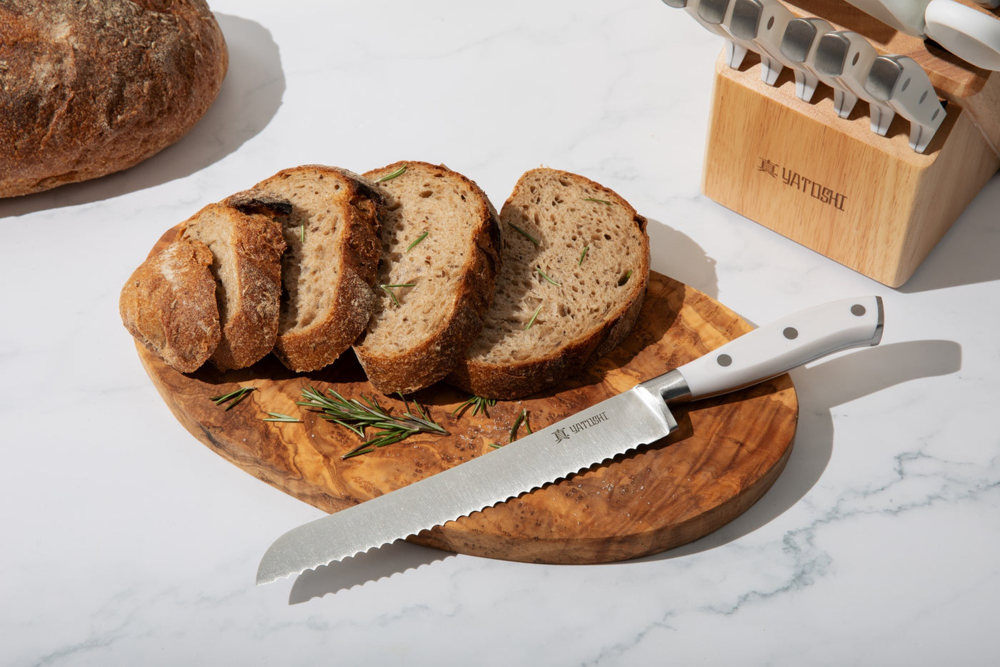 white abs bread knife with bread
