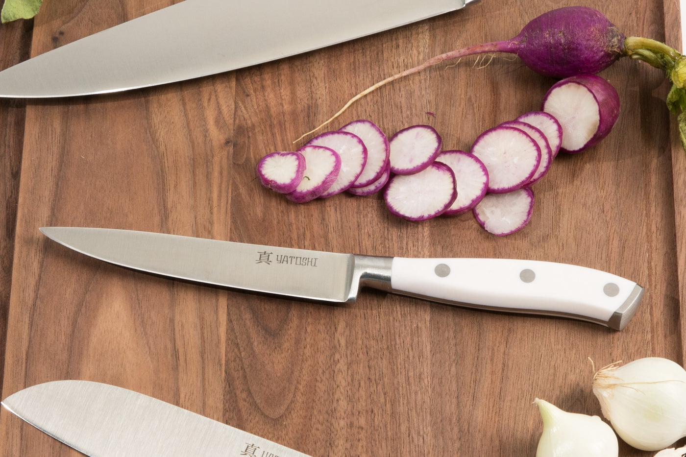 white abs utility knife with radish